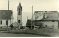 Blick auf die Pfarrkirche links und den freistehenden Kirchturm vor dem Brand von 1942. Bildquelle: Gemeindearchiv Serfaus.